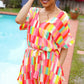 Eyes On You Coral & Yellow Geo Abstract Surplice Woven Romper