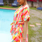 Eyes On You Coral & Yellow Geo Abstract Surplice Woven Romper