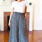 Let's Meet Up Black Animal Print Smocked Waist Palazzo Pants