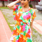 Under The Sun Abstract Floral Smocked Waist V Neck Flutter Sleeve Romper