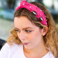 Fuchsia Stone & Gem Football Embellished Top Knot Headband