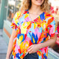 Orange & Yellow Geometric Floral V Neck Dolman Top