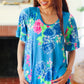 Feeling Playful Blue Floral Ruffle Sleeve & Hem Tunic Top