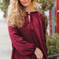 Holiday Vibes Burgundy Frill Detail Tie Neck Satin Top