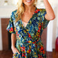 Navy Tropical Floral Surplice Romper