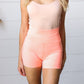 Coral Washed Seamless High Waisted Eyelet Shorts