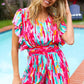 Feeling Bold Fuchsia Abstract Print Smocked Waist Flutter Sleeve Romper