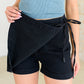 Bentli High Rise Side Tie Denim Skort in Black