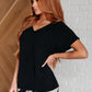 Frequently Asked Questions V-Neck Top in Black