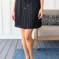 Just a Flirt Pleated Skirt in Black